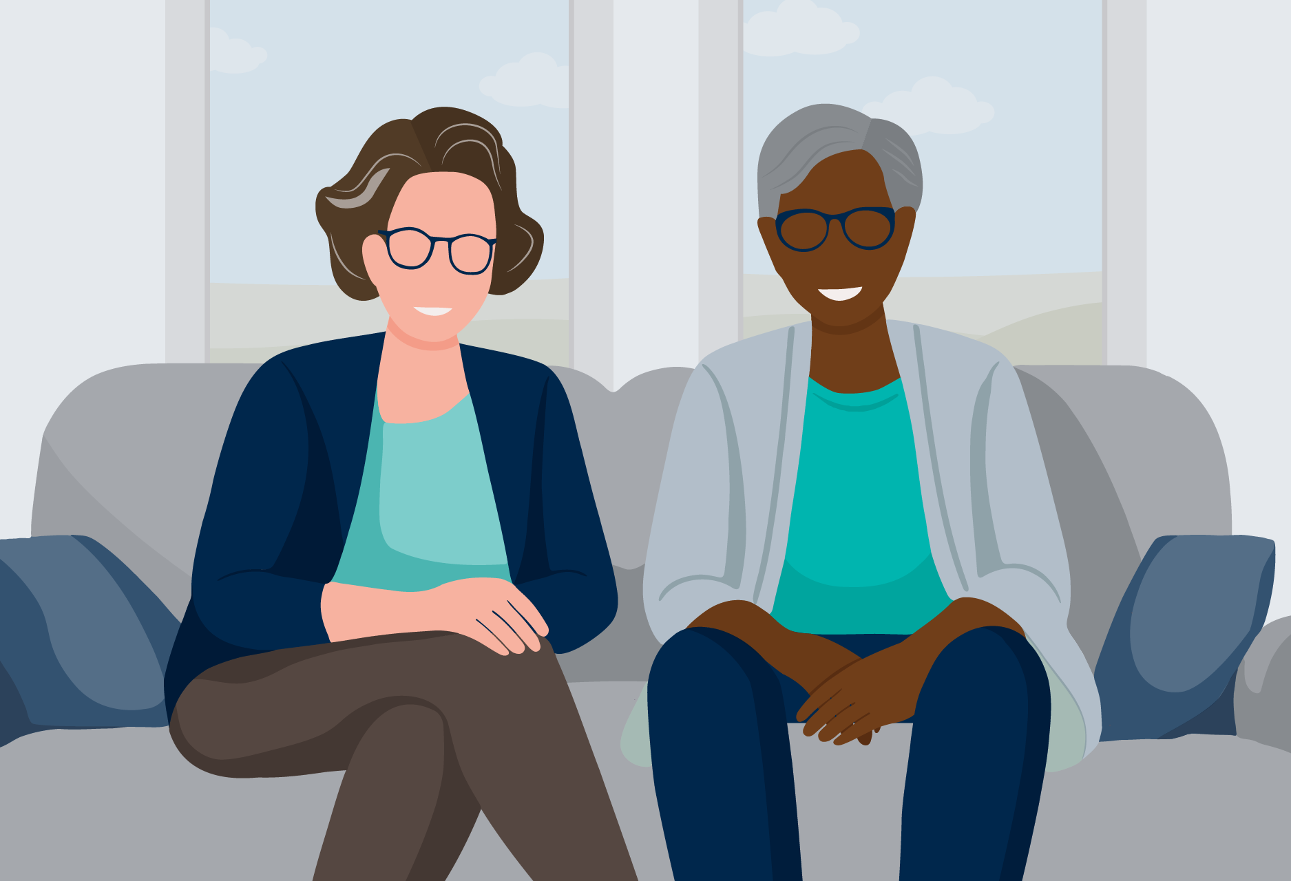 two older adults sitting on couch