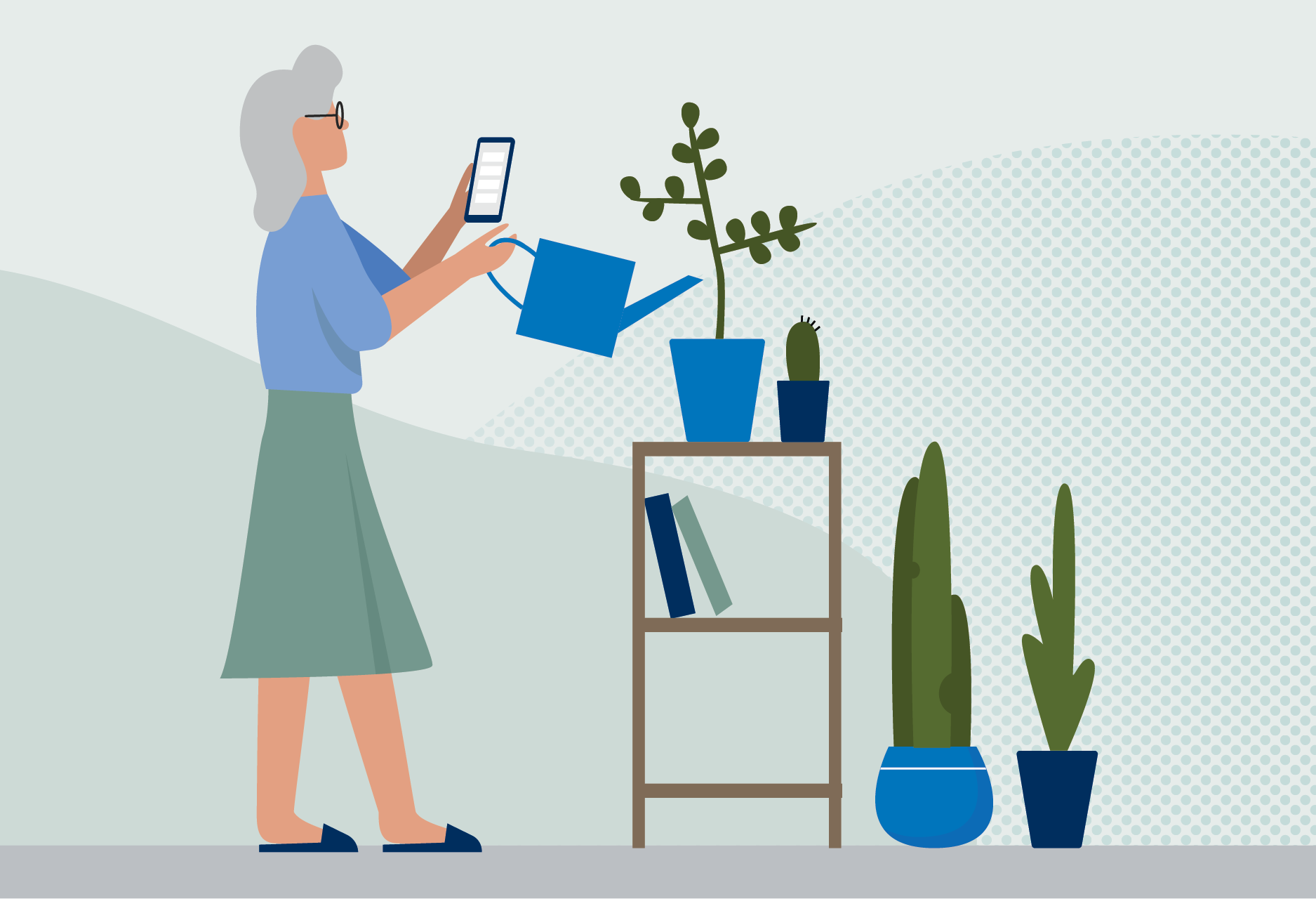 An older woman watering plants in a workplace