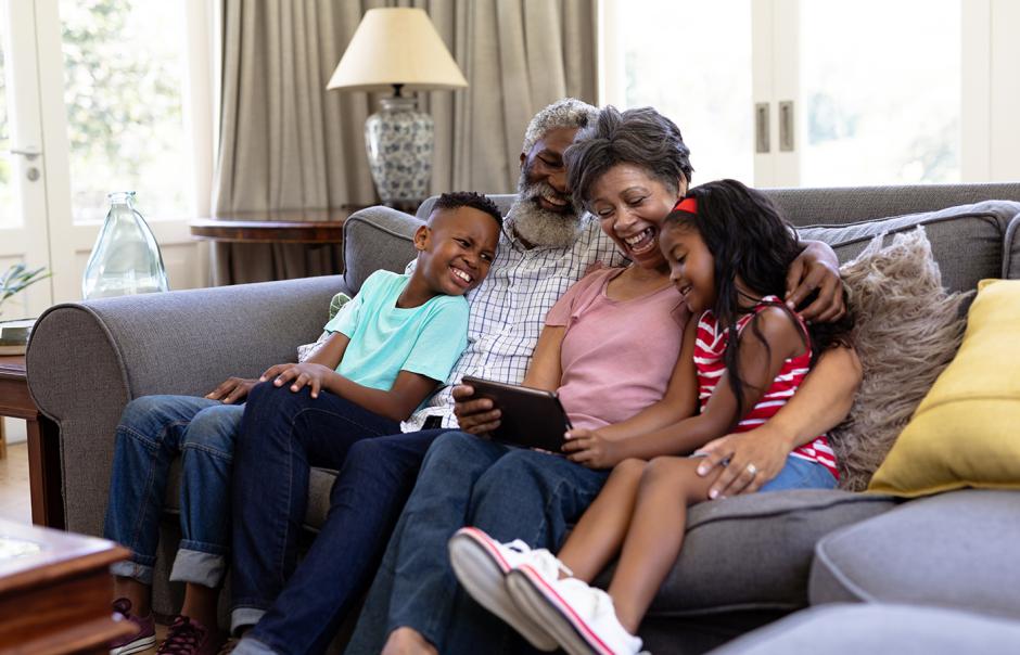 senior couple with their grandchildren at home